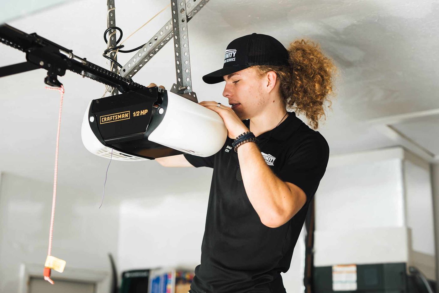 Trinity technician at a residential garage opener